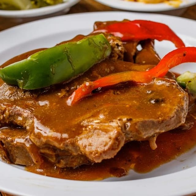 Smothered Pork Chops with Two Sides.