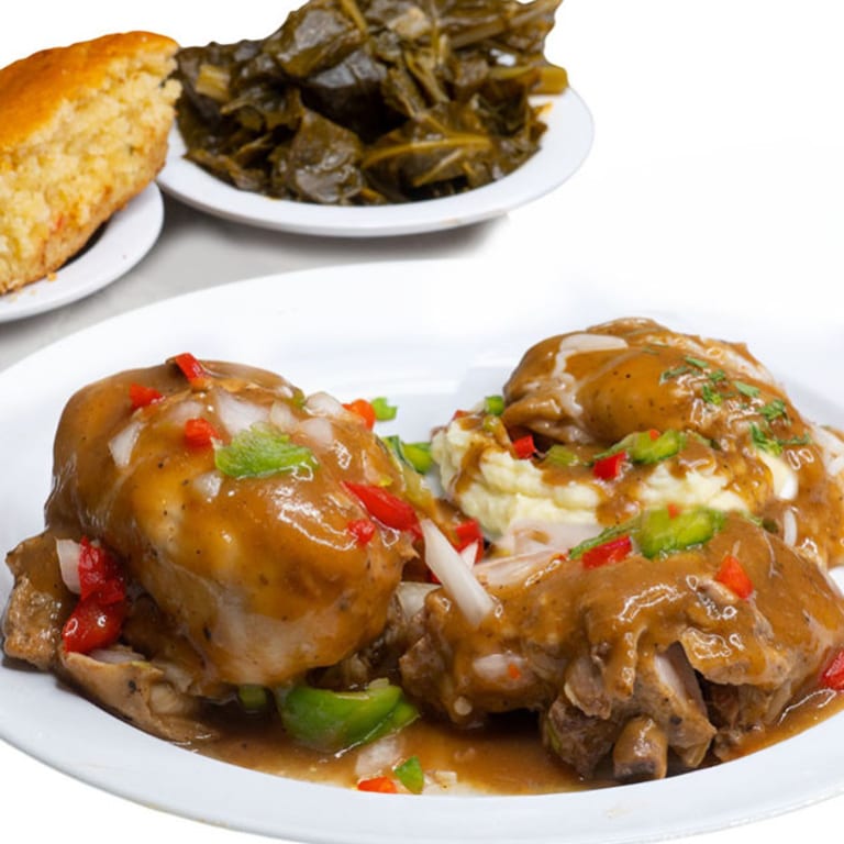 Indulge in Our Smothered Chicken