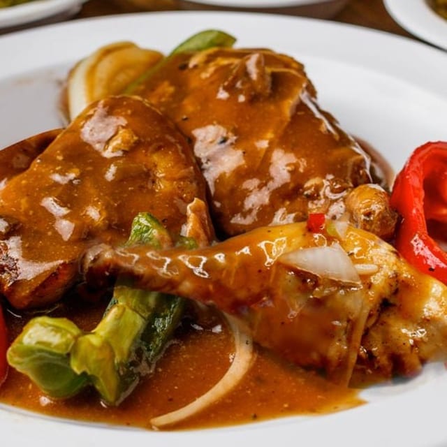 Smothered Chicken with Two Sides.